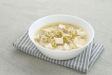 Ca Tauge or Tumis Tauge,  Indonesian stir fried bean sprouts mixed with tofu, served in white bowl. Selected focus.
