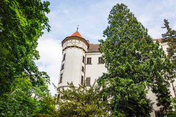 Fototapeta na wymiar Medieval Konopiste castle - the residence of Habsburg imperial family surrounded by the trees
