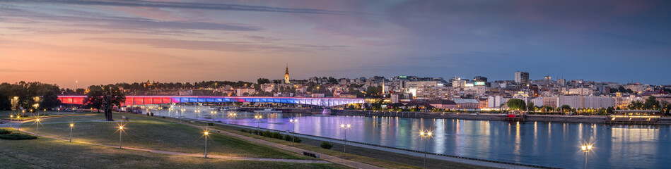 Belgrade Sava River Branco’s Bridge illuminated in Serbian flag colors