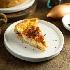 Traditional homemade French quiche with onion and bacon