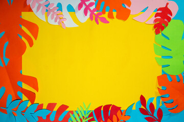 yellow paper around it jungle leaves, creative summer concept, jungle leaf, colorful background