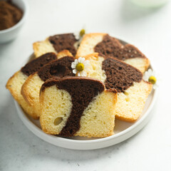 Homemade vanilla chocolate marbled cake on a plate
