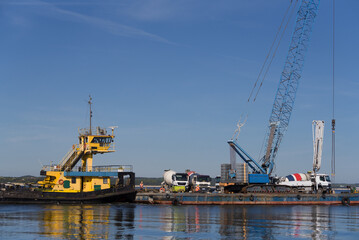 PUSHER TUG AND BARGE - A floating platform with crane for hydrotechnical works and concrete mixer...