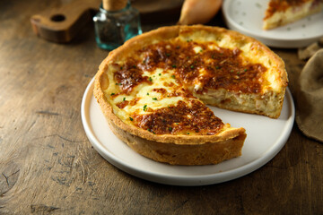 Traditional homemade French quiche with onion and bacon
