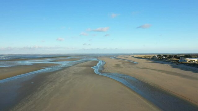 Utah beach and its sand dunes in Europe, France, Normandy, towards Carentan, in spring, on a sunny day.