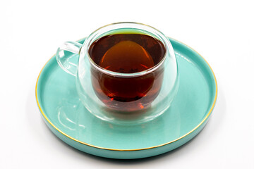 Black tea on a white background. Turkish tea brewed with hot water. close up