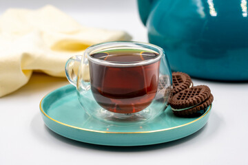 Black tea on a white background. Turkish tea brewed with hot water. close up