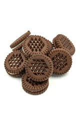 Cocoa biscuits with cream filling on a white background. close up