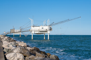 trabocchi sul pontile di Ravenna in Italia