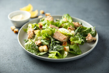 Homemade salad with croutons and salmon
