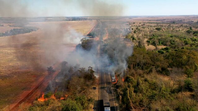 Aerial view of bush fire beside highway, fire, bush, danger