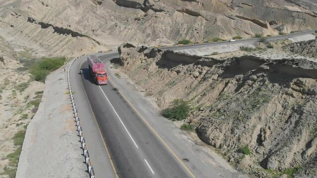 Aerial shot of Makran Coastal Highway along Pakistan's Arabian Sea coast from Karachi to Gwadar in Baluchistan province.