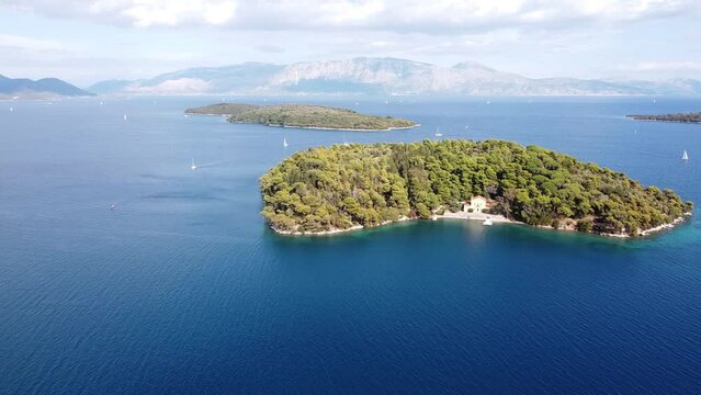Nidri, Lefkada, Greece - Aerial of Madouri Island, Boats and Monastery