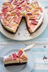 Cheesecake brownie with rhubarb and powder sugar  - 506409095