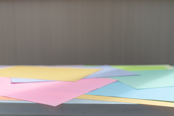 empty table with colored paper.