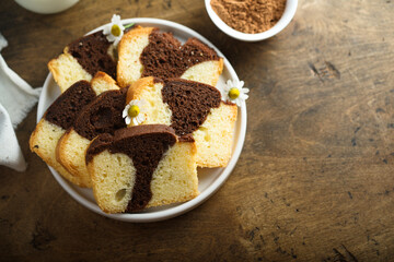 Homemade vanilla chocolate marbled cake on a plate