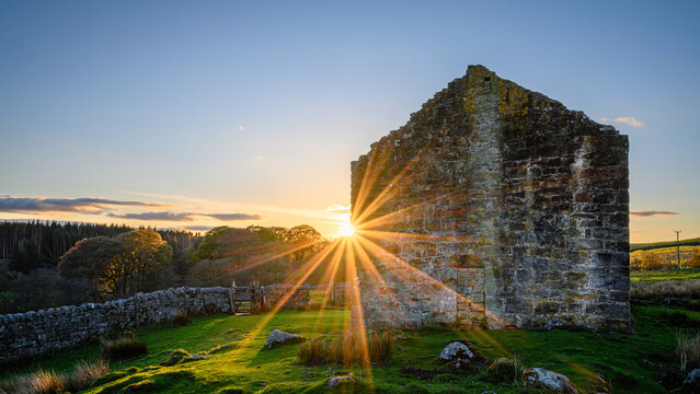 Sunstar on Black Middens Bastle House, in the Dark Skies section of the Northumberland 250, a scenic road trip though Northumberland with many places of interest along the route