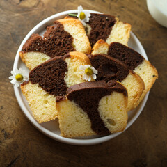Homemade vanilla chocolate marbled cake on a plate