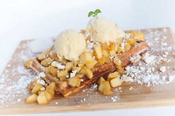 waffles with whipped ice cream and apple