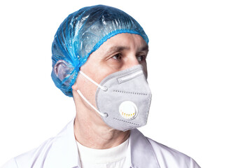A doctor wearing medical respirator and uniform on blue background, isolated. COVID-19 protection.