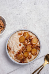 Porridge with caramelised banana and walnut for healthy breakfast