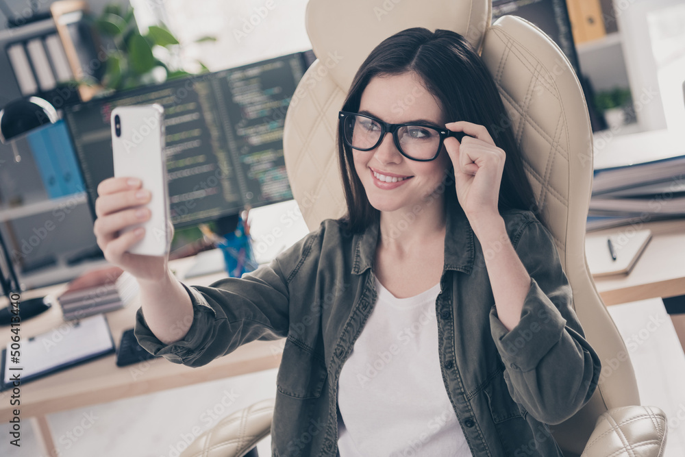 Aufkleber portrait of attractive cheerful skilled intellectual girl web developer sitting in chair taking self