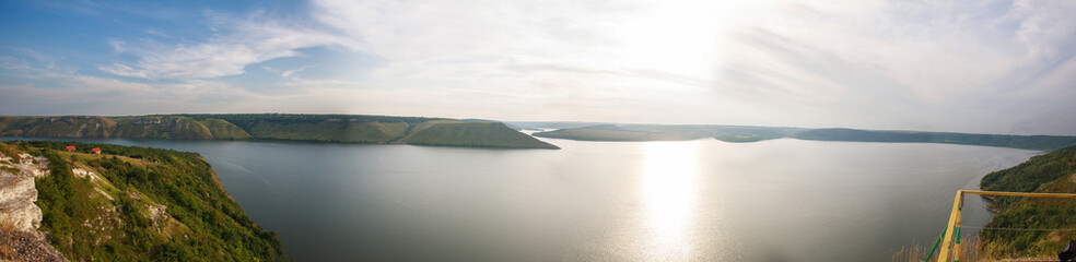 Beautiful landscape over the river on background of magnificent sky, panorama of Bakota bay, nature in Ukraine