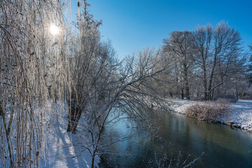 A sunny winter day by the river Spree in Cottbus , Brandenburg, Germany. Winter in the city. 