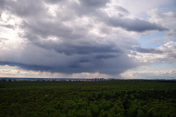 Rain dark clouds in the sky during a storm in a dramatic sky