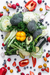 Vegetables and fruits, flat lay isolated on white background.