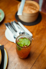 Close up of cocktails and food at restaurant