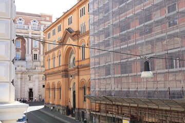 Obraz premium Rome Street View with Waldensian Church Facade and Building Exterior with Scaffolding, Italy