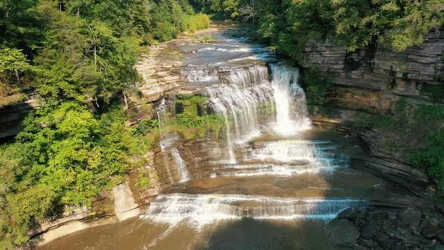 Cummins Falls Flowing Into The River With Verdant Forest In Tennessee, Nashville. - aerial