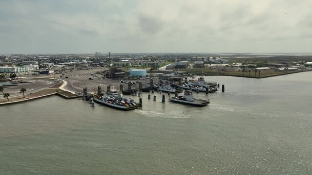 Aerial view approach of Aransas Pass Ferry heading to port with cars