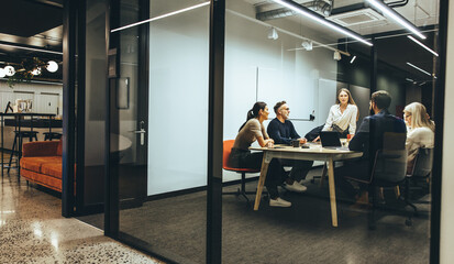 Team of businesspeople having a meeting in a boardroom