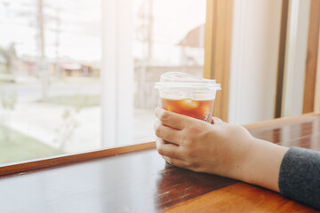 Americano with the hands of a businesswoman