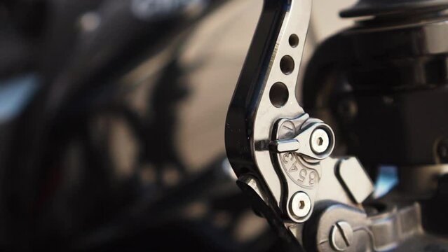 Close view of a metal front brake in a motorcycle