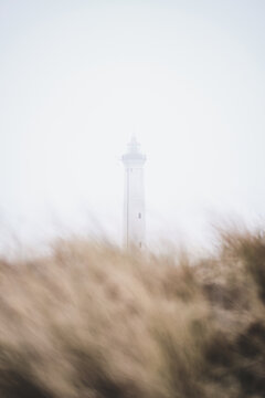 Lighthouse covered in Fog. High quality photo
