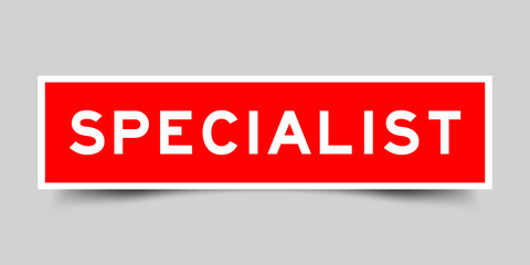Sticker label with word specialist in red color on gray background