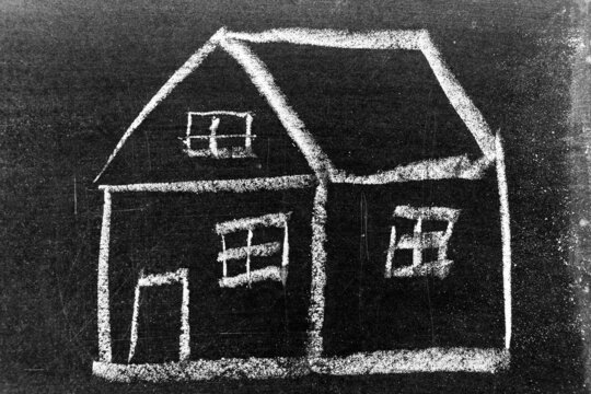 White color chalk hand drawing in home or house shape on blackboard background - Powered by Adobe