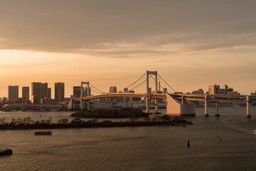 Fototapeta na wymiar The Rainbow Bridge neighborhood in Tokyo Japan at Sunset