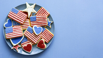 Fototapeta premium home baking patriotic cookies icing like american flag. patriotic background for US national holidays, happy Memorial Day 