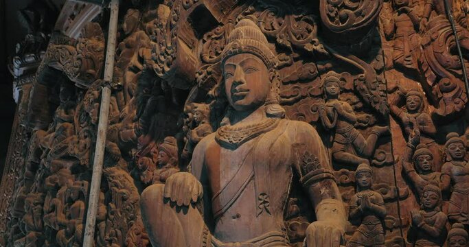Interior Sanctuary of Truth (Prasat Sut Ja-Tum), beautiful wooden temple by the sea on the outskirts of Pattaya Thailand, Amazing Thailand travel concept.