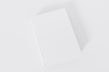 mockup of a rectangular book with a blank glossy cover on white background. Isolated with clipping path.
