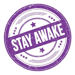 STAY AWAKE text on violet indigo round grungy stamp.