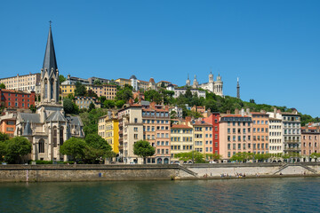 Fototapeta na wymiar View of the basilica Fourviere at the top of hill and the river Rhône at the picturesque city of Lyon