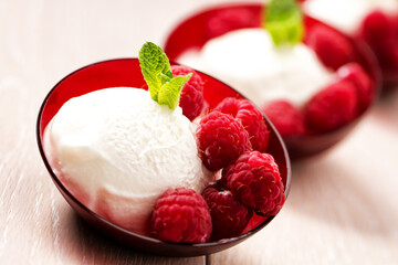 Ice cream with fresh raspberries. High quality photo