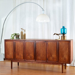 Mid-Century Modern Credenza.  Vintage storage cabinet. Interior view of wood hutch with decor and...