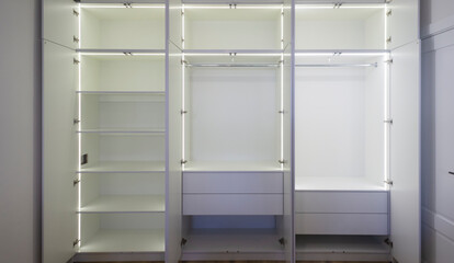 Large stylish minimalistic open door closet wardrobe home room empty mockup copy space