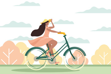 woman riding bike in landscape © Gstudio